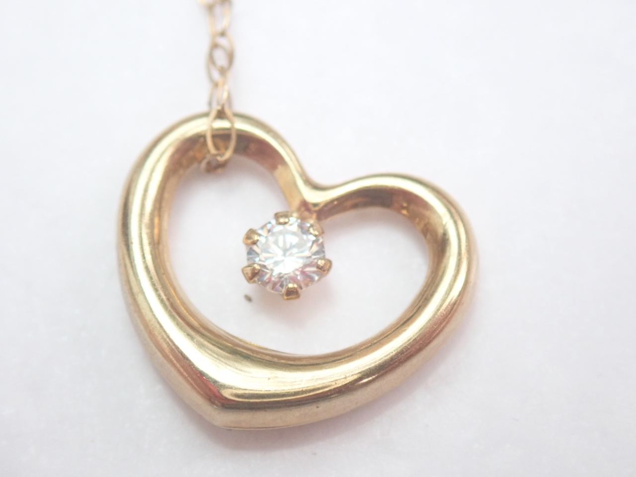 Floating Heart Cubic Zirconia Pendant 375 9k - 16 inch 9k gold Chain